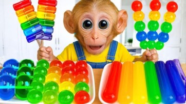 Monkey baby playing with toys